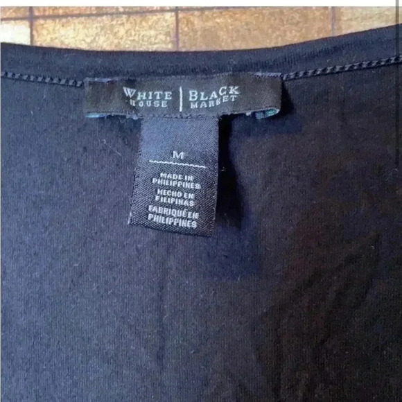 WHBM pearl button long sleeve black top. Size M - Picture 2 of 4